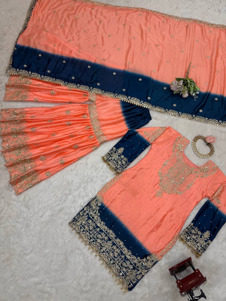 Peach Embroidered Salwar Kameez With Navy Accents