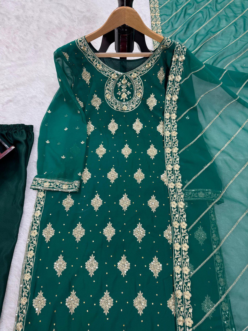 "Elegant Threadwork Ensemble with Sequins and Lace"
