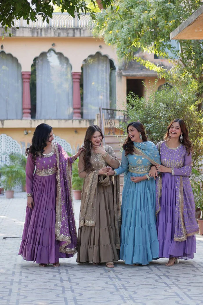 "Luxurious Star Georgette Gown with Frill Stitching & Embroidered Dupatta"
