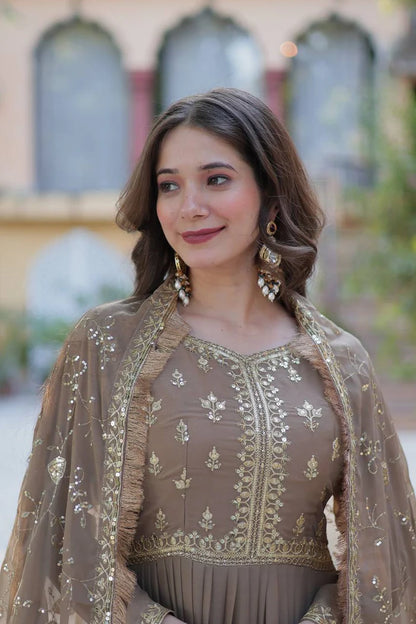 "Luxurious Star Georgette Gown with Frill Stitching & Embroidered Dupatta"