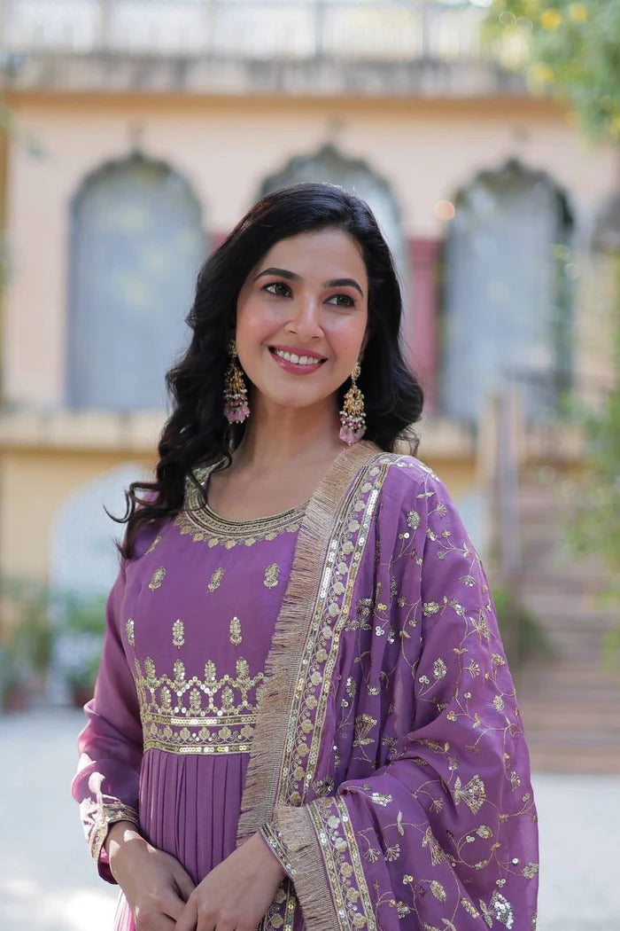 "Luxurious Star Georgette Gown with Frill Stitching & Embroidered Dupatta"