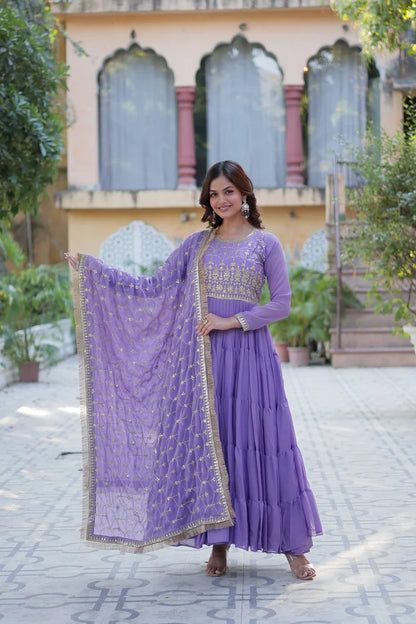 "Luxurious Star Georgette Gown with Frill Stitching & Embroidered Dupatta"
