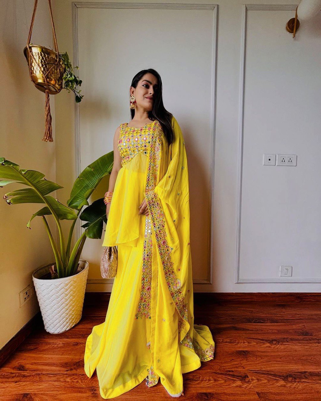"Elegant Foux Gorgette Ensemble with Thread Work & Sequence Detailing"