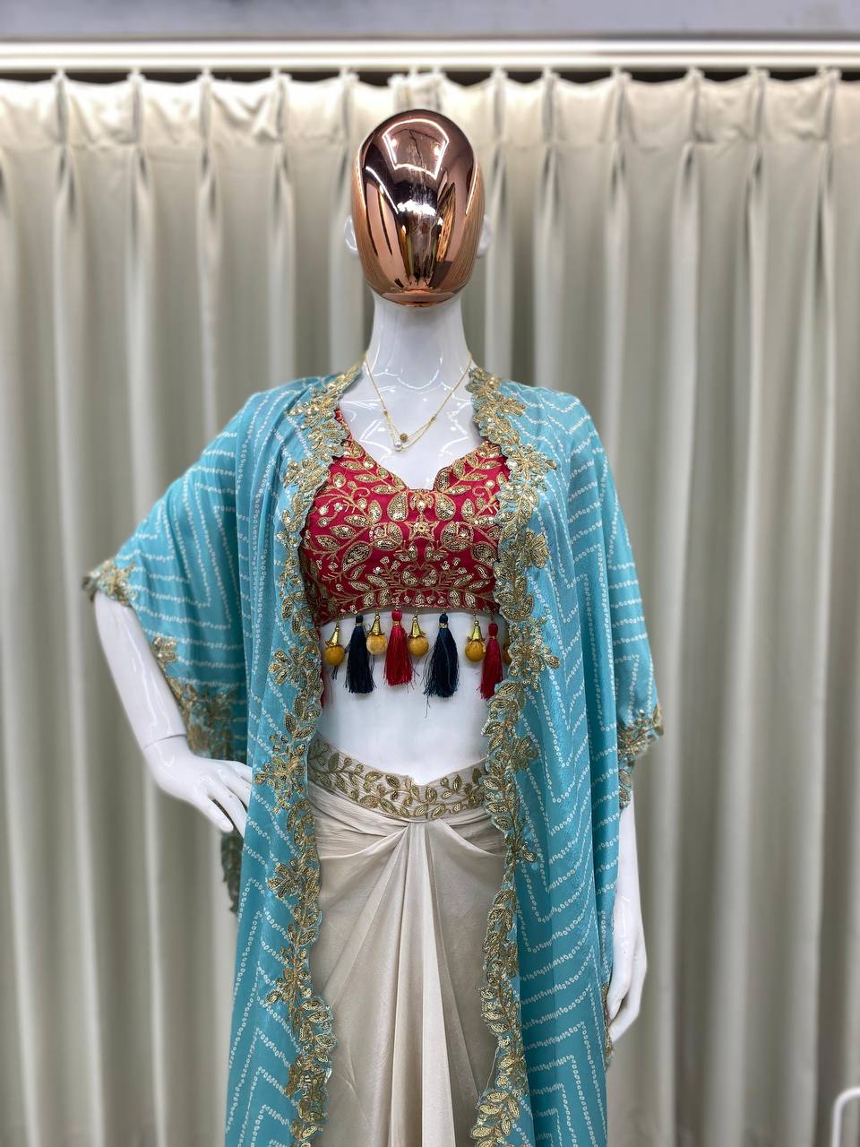 "Elegant Sequence Embroidered Ensemble: Tube Blouse, Draped Skirt & Shrug"