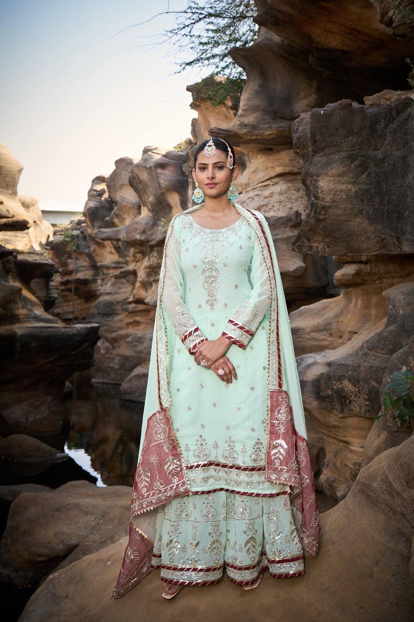 "Elegant Foux Gorgette Sharara Set with Intricate Thread and Sequence Work"